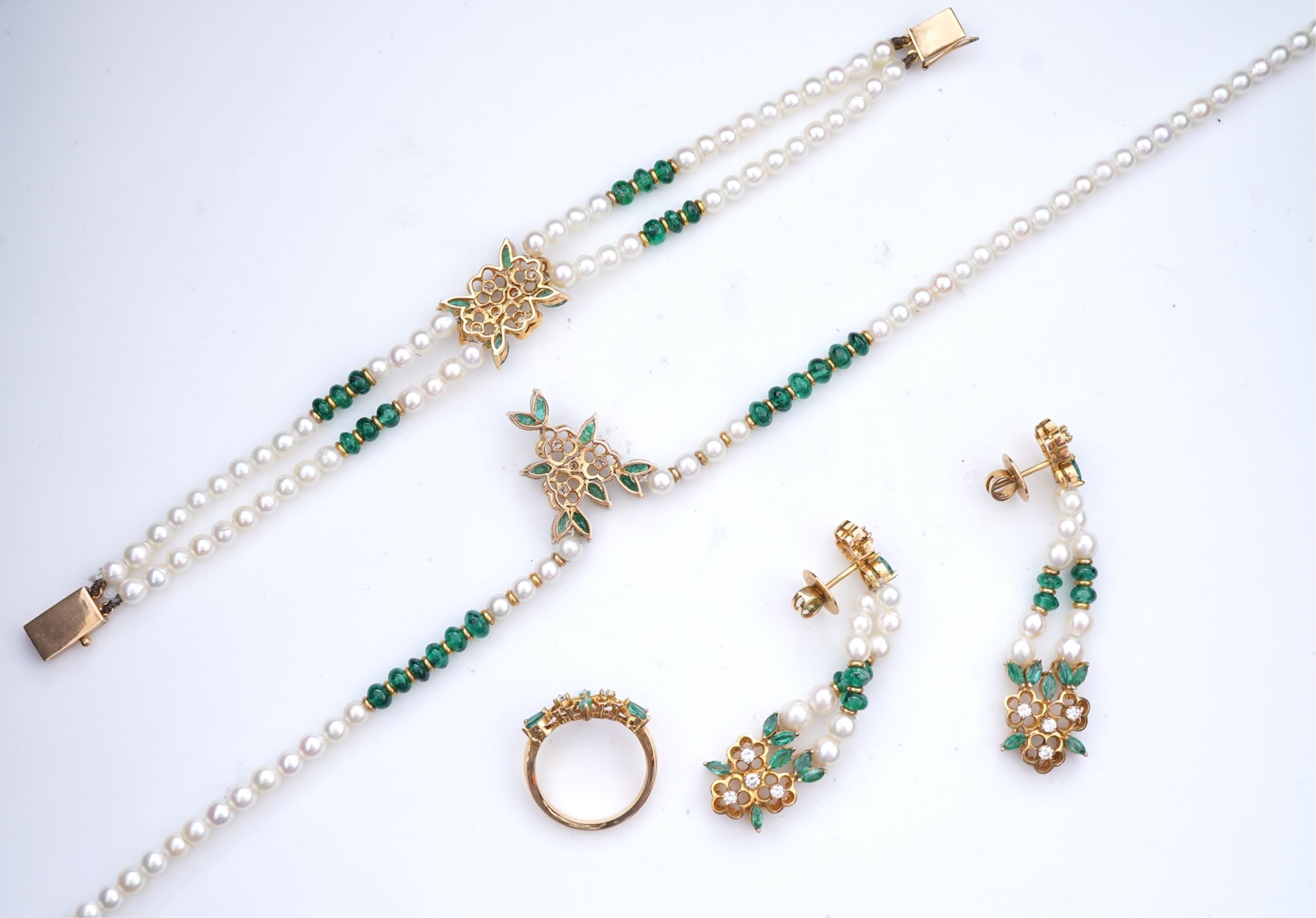 A cultured pearl, emerald and diamond parure